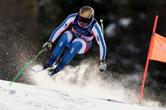 France's Nils Allegre speeds down the course during an alpine ski, men's downhill official training, at the 2026 Winter Olympics, in Bormio, Italy, Thursday, Feb. 5, 2026. (AP Photo/Gabriele ...