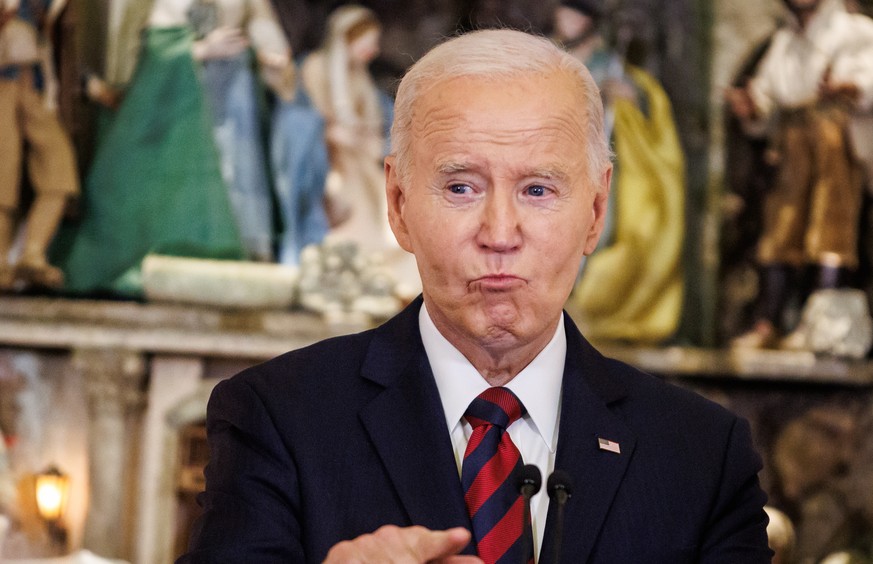 epa11769702 US President Joe Biden chokes back tears while speaking about when he got the phone call that his first wife and infant daughter were killed in a car accident, will delivering remarks at a ...