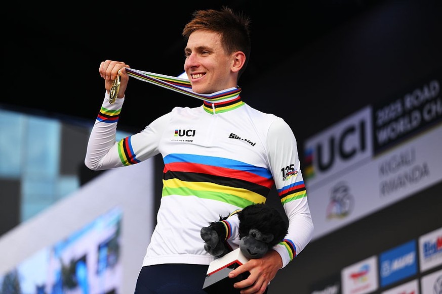 KIGALI, RWANDA - SEPTEMBER 28: Gold medalist Tadej Pogacar and Team Slovenia celebrates winning during the medal ceremony after the 98th UCI Cycling World Championships Kigali 2025, Men Elite Road Rac ...