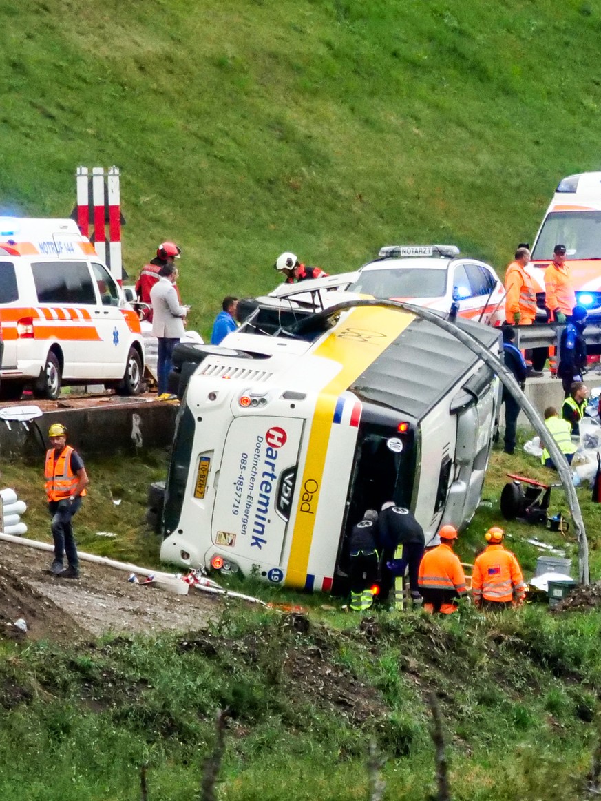 Emergency responders at the scene of an accident involving a travel coach in Susch in the canton of Grisons, Switzerland, on Thursday, September 10, 2026. Several people died in a tour bus accident on ...
