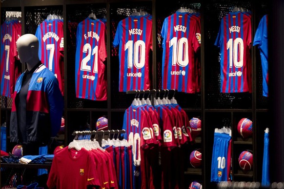 Lionel Messi soccer shirts on sale at Barcelona&#039;s merchandise store at the Camp Nou stadium in Barcelona, Spain, Thursday, Aug. 5, 2021. Barcelona announced Thursday that Messi will not stay with ...