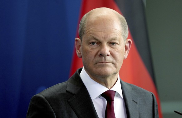 German Chancellor Olaf Scholz attends a joint press conference after a meeting with the Emir of Qatar, Sheikh Tamim bin Hamad Al Thani, at the chancellery in Berlin, Germany, Friday, May 20, 2022. (AP ...