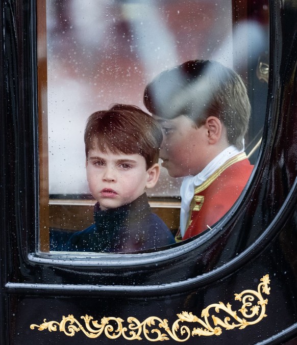 LONDON, ENGLAND - MAY 06: Prince Louis and Prince George travel by carriage during the Coronation of King Charles III and Queen Camilla on May 06, 2023 in London, England. The Coronation of Charles II ...