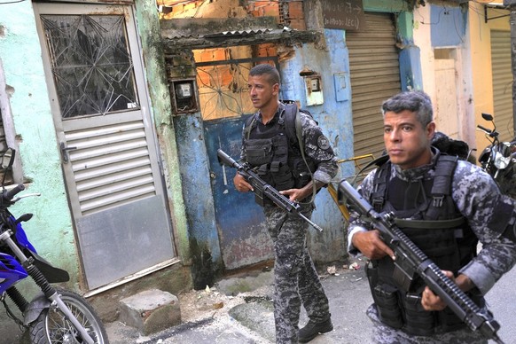 Military police occupy the Jacarezinho favela in Rio de Janeiro, Brazil, Wednesday, Jan. 19, 2022. Military police started to occupy the favela as the first phase of Rio de Janeiro state government&#0 ...