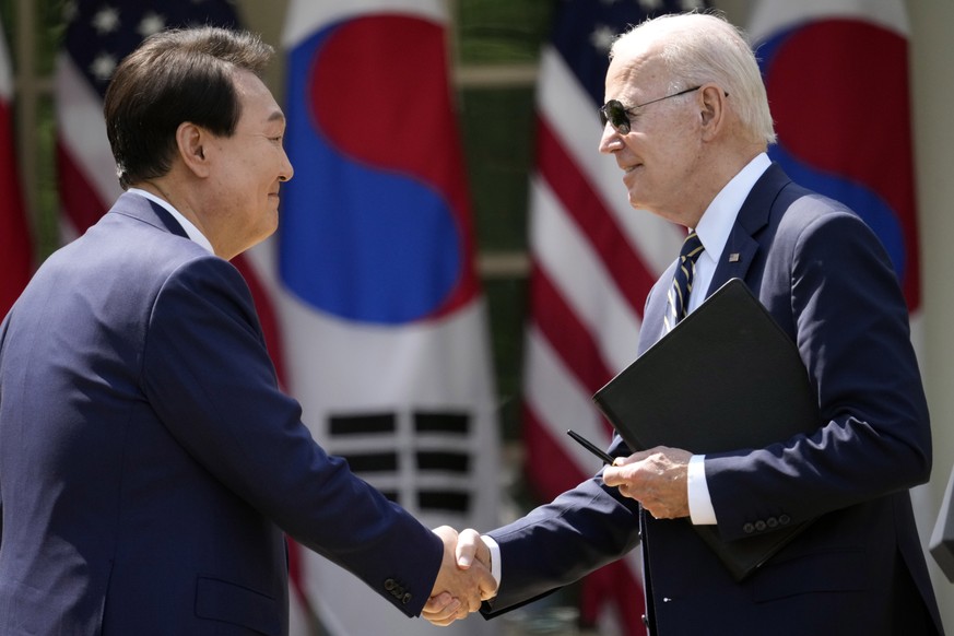 President Joe Biden and South Korea&#039;s President Yoon Suk Yeol shake hands after a news conference in the Rose Garden of the White House Wednesday, April 26, 2023, in Washington. (AP Photo/Andrew  ...