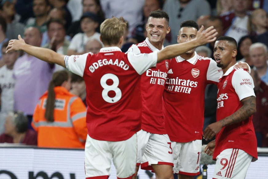 Arsenal&#039;s team players celebrate after Gabriel Jesus, right, scored the opening goal during the English Premier League soccer match between Arsenal and Aston Villa at the Emirates Stadium in Lond ...