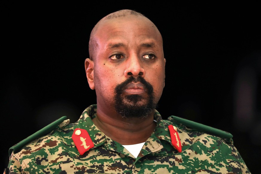 FILE - Lt. Gen. Muhoozi Kainerugaba, son of Uganda's President Yoweri Museveni, attends a "thanksgiving" ceremony in Entebbe, Uganda late Saturday, May 7, 2022. (AP Photo/Hajarah Nalwad ...