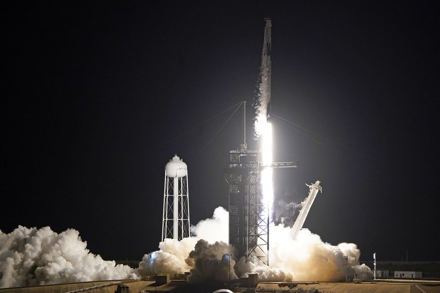A SpaceX Falcon 9 lifts off with four private citizens from Pad 39A at the Kennedy Space Center in Cape Canaveral, Fla., Wednesday, Sept. 15, 2021. (AP Photo/John Raoux)