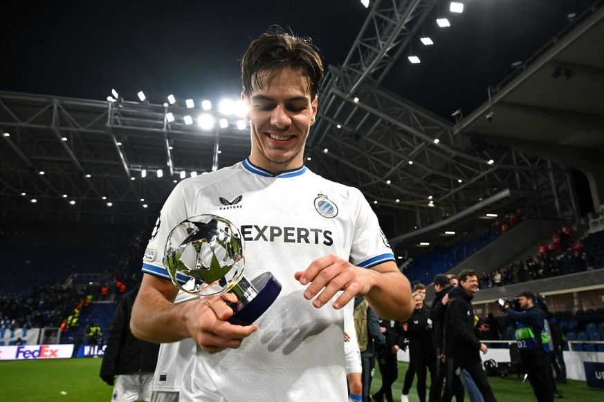 BERGAMO, ITALY - FEBRUARY 18: Ardon Jashari of Club Brugge KV smiles with the PlayStation Player of the Match trophy following the UEFA Champions League 2024/25 League Knockout Play-off second leg mat ...