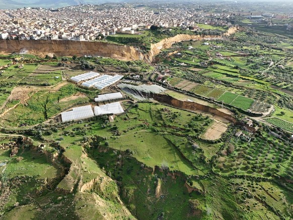 epa12682663 An aerial view taken with a drone shows the site of a landslide at Niscemi, Caltanissetta province, Sicily Island, southern Italy, 26 January 2026. Following days of heavy rainfall brought ...