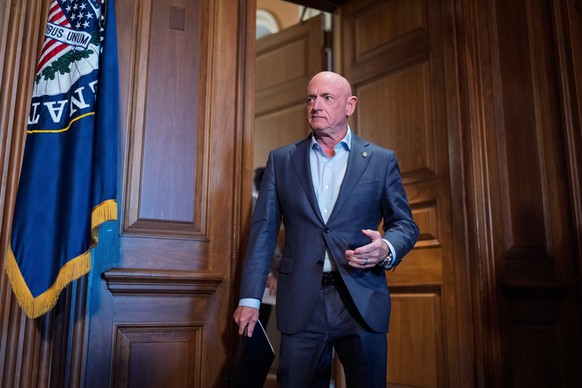 Sen. Mark Kelly, D-Ariz., arrives to refute efforts by President Donald Trump and Defense Secretary Pete Hegseth to intimidate him and other lawmakers after expressing concerns over U.S. military stri ...