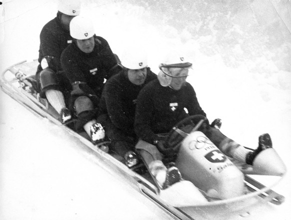 The Swiss bobsled "Schweiz 2" was qualified victor of the Olympic four-man bobsled races after the finish of the fourth course, February 12, 1936. The team: Pierre Musy, driver; Charles Bouv ...