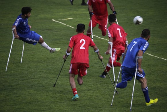 epa10803300 Palestinian amputee soccer players take part in the unity amputation football championship final 2023 between Al-Quds and Haifa teams, supported by the International Committee of the Red C ...