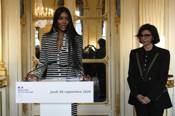Naomi Campbell delivers a speech after being awarded with the medal of &quot;Chevalier de l&#039;Ordres des Arts et des Lettres&quot;, by French Culture Minister Rachida Dati, right, at the Culture mi ...