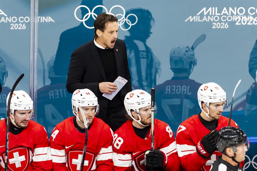 Patrick Fischer, head coach of Switzerland national ice hockey team, reacts, during the men's group A preliminary round game between Switzerland and France at the 2026 Olympic Winter Games in Mil ...