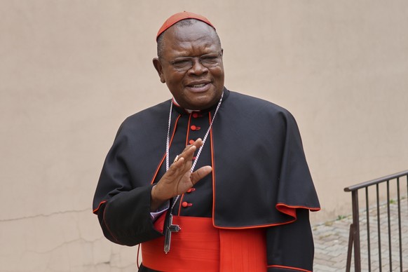 Cardinal Fridolin Ambongo Besungu arrives to celebrate Mass at his titular church, San Gabriele Arcangelo all&#039;Acqua Traversa three days before the conclave to elect the 267th pope of the Roman Ca ...