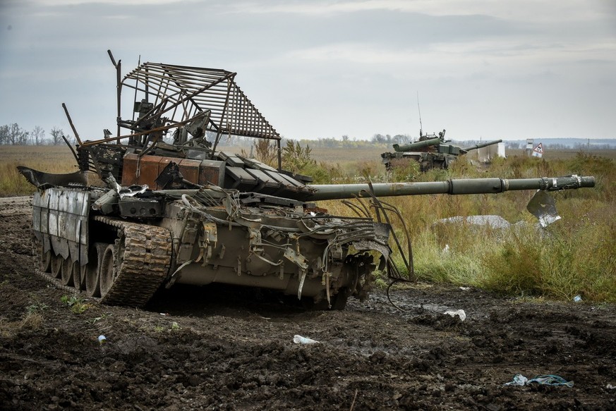 epa10216479 Captured Russian tanks, in Kharkiv region, Ukraine, 30 September 2022. The Ukrainian army pushed Russian troops from occupied territory in the northeast of the country in a counterattack.  ...