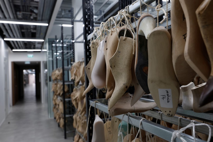 Rows of clients' customised shoe models are pictured at the factory of the Maison Massaro shoemaking label at Chanel's Metiers d'Art workshops at le 19M, the building which houses aroun ...