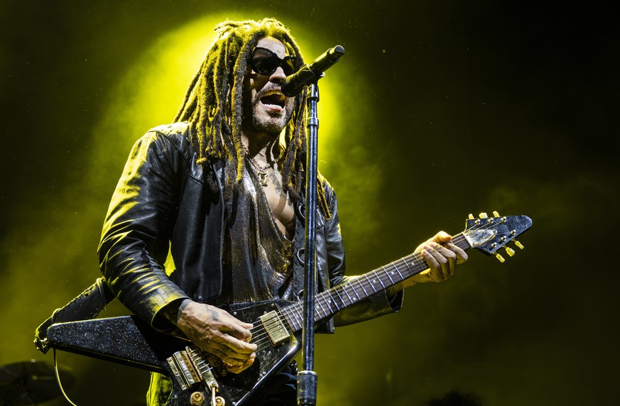 epa11982724 US musician Lenny Kravitz performs on stage at the Royal Arena in Copenhagen, Denmark, 22 March 2025. EPA/Torben Christensen DENMARK OUT