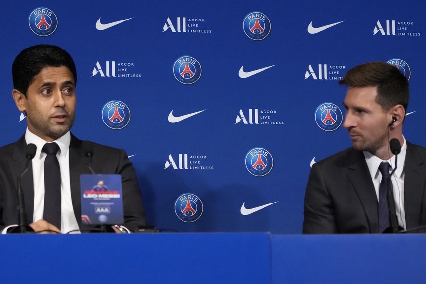 Lionel Messi, right, and PSG president Nasser Al-Al-Khelaifi attend a press conference Wednesday, Aug. 11, 2021 at the Parc des Princes stadium in Paris. Lionel Messi said he&#039;s been enjoying his  ...