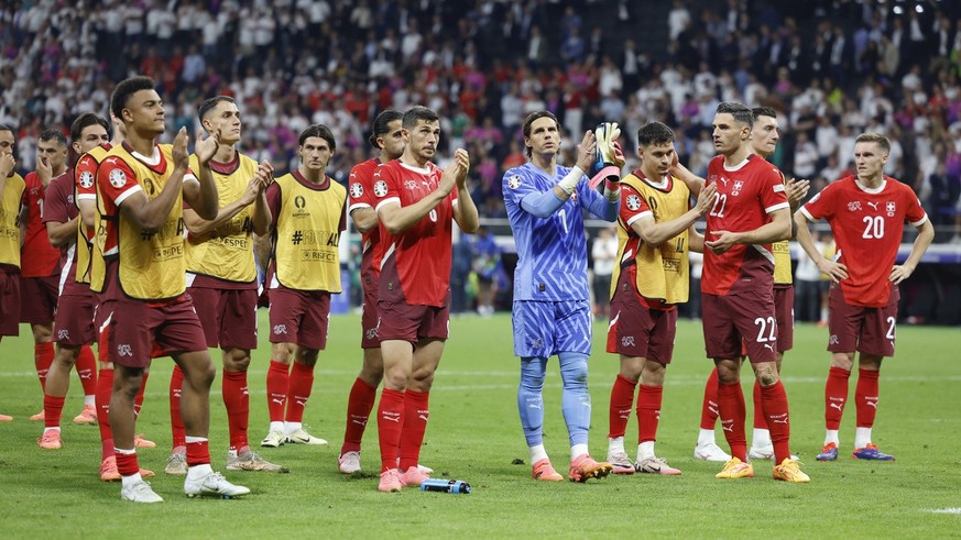 Switzerland&#039;s players wave to their fans after a Group A match between Switzerland and Germany at the Euro 2024 soccer tournament in Frankfurt am Main, Germany, Sunday, June 23, 2024. (KEYSTONE/P ...