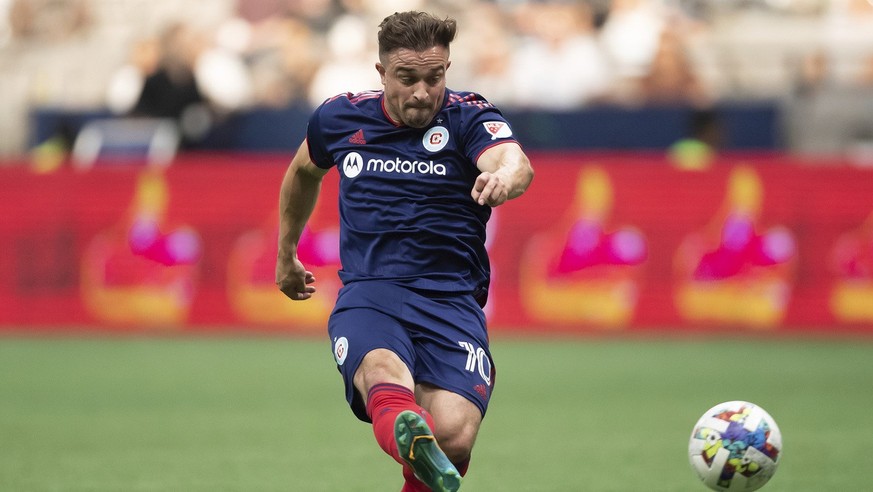 Chicago Fire&#039;s Xherdan Shaqiri scores a goal against the Vancouver Whitecaps during the first half of an MLS soccer match Saturday, July 23, 2022, in Vancouver, British Columbia. (Darryl Dyck/The ...