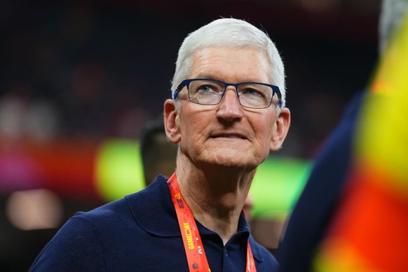 NEW ORLEANS, LA - FEBRUARY 09: Apple CEO Tim Cook is seen on the field prior to Super Bowl LIX between the Kansas City Chiefs and the Philadelphia Eagles at Caesars Superdome on February 9, 2025 in Ne ...