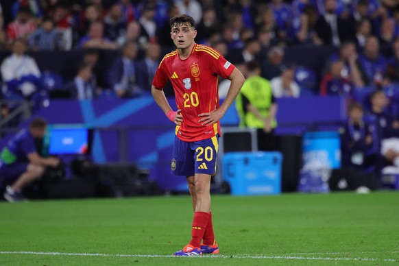 epa11426570 Pedri of Spain looks on during the UEFA EURO 2024 group B soccer match between Spain and Italy, in Gelsenkirchen, Germany, 20 June 2024. EPA/OLIVIER MATTHYS