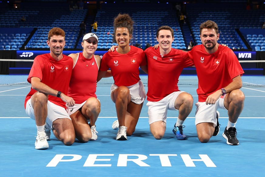 PERTH, AUSTRALIA - JANUARY 07: Luca Castelnuovo, Belinda Bencic, Naima Karamoko, Jakub Paul and Stan Wawrinka of Team Switzerland pose after winning the Quarter Final against Team Argentina during Day ...