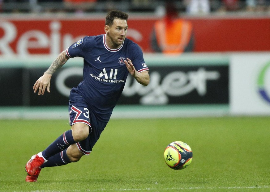 epa09436124 Paris Saint-Germain&#039;s Lionel Messi in action during the French Ligue 1 soccer match between Stade Reims and Paris Saint-Germain (PSG) at Stade Auguste-Delaune II in Reims, France, 29  ...