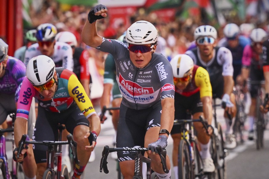 KEYPIX - Belgian rider Jasper Philipsen of the Alpecin&amp;#x2013;Deceuninck team, right, wins the eighth stage of La Vuelta from Monz