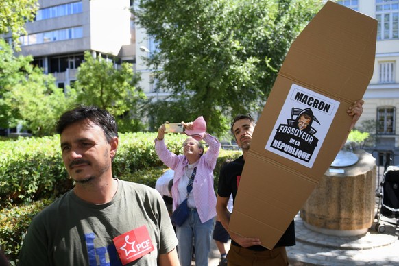 Demonstration in Madrid against Frances new prime minister, Michel Barnier A man with a sign during a demonstration against Frances new prime minister, Michel Barnier, at the Place de la Villa in Pari ...