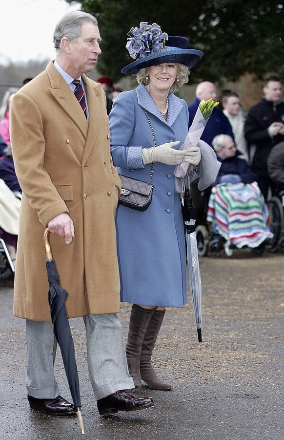 KING&#039;S LYNN, ENGLAND - DECEMBER 25: Prince Charles, Prince of Wales, and his wife Camilla, Duchess of Cornwall, attend Christmas Day service at Sandringham Church on December 25, 2005 in King&#03 ...