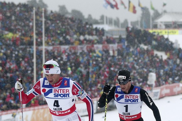 Switzerland&#039;s Dario Cologna in action behind Norway&#039;s Petter Northug during the men&#039;s 50 km classic mass start competition at the 2015 Nordic World Skiing Championships in Falun, Sweden ...
