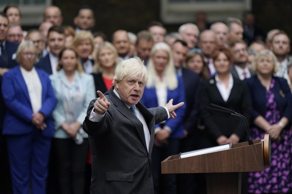 Outgoing British Prime Minister Boris Johnson speaks outside Downing Street in London, Tuesday, Sept. 6, 2022 before heading to Balmoral in Scotland, where he will announce his resignation to Britain& ...