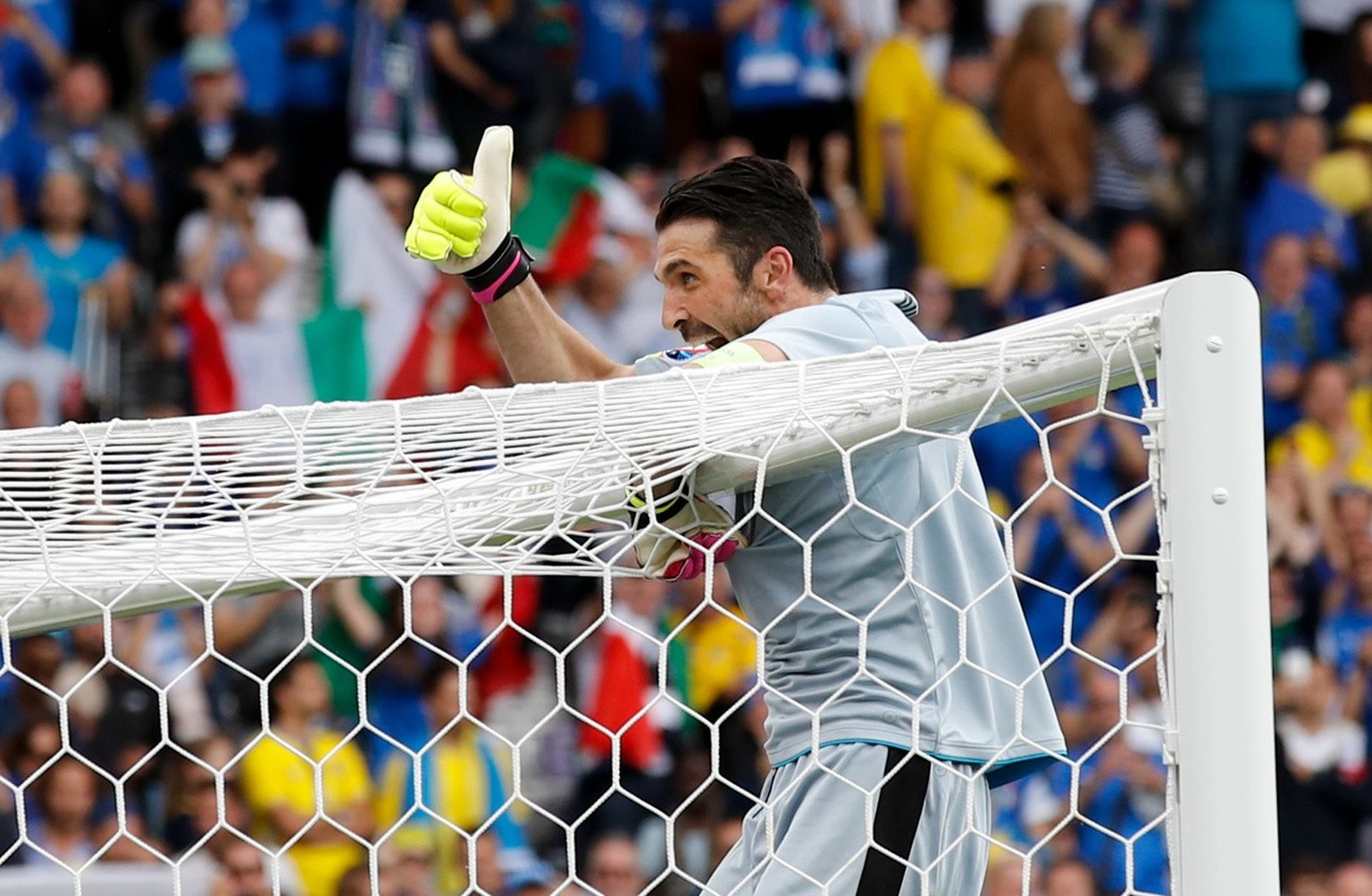 Italy goalkeeper Gianluigi Buffon celebrates at the end of the Euro 2016 Group E soccer match between Italy and Sweden at the Stadium municipal in Toulouse, France, Friday, June 17, 2016. Italy won 1- ...