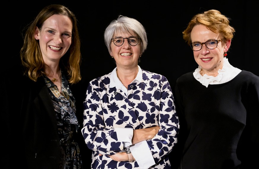 Evi Allemann, gauche, candidate PS pour le canton de Berne, Elisabeth Baume-Schneider, centre, candidate du PS pour le canton du Jura et Eva Herzog, droite, candidate PS pour le canton de Bale, posent ...