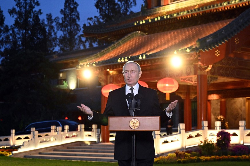 Russian President Vladimir Putin speaks to journalists following the Belt and Road Forum at the Diaoyutai State Guest House in Beijing, China, on Wednesday, Oct. 18, 2023. (Grigory Sysoyev, Sputnik, K ...