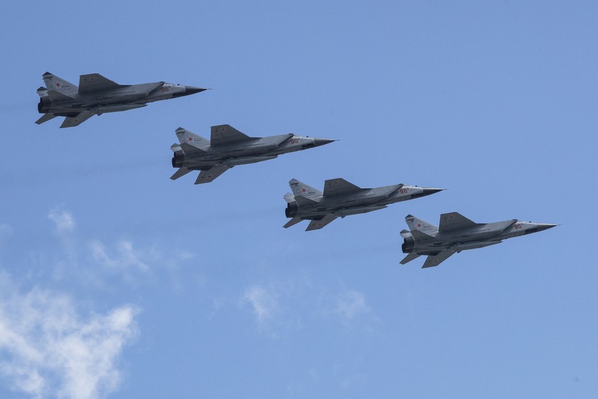 FILE - Russian&#039;s Air Force Mikoyan MiG-31K jets carrying Kh-47M2 Kinzhal nuclear-capable air-launched ballistic missiles fly over Red Square during a rehearsal for the Victory Day military parade ...