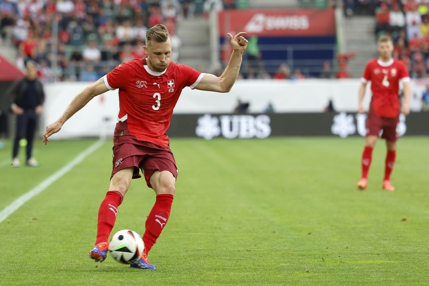 Switzerland&#039;s Silvan Widmer in action during an international friendly soccer match between Switzerland and Austria at the kybunpark stadium in St. Gallen, Switzerland, Saturday, June 8, 2024. (K ...