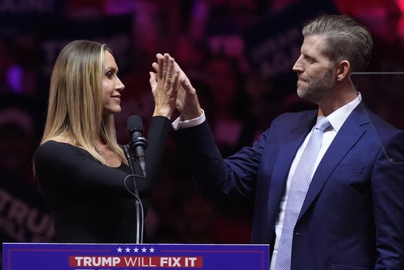 Eric Trump and his wife Lara, speak before Republican presidential nominee former President Donald Trump at a campaign rally at Madison Square Garden, Sunday, Oct. 27, 2024, in New York. (AP Photo/Eva ...