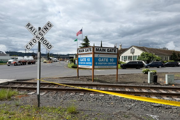 The exterior of the Nippon Dynawave Packaging Co. is shown, after a tank containing hazardous liquid imploded, on Tuesday, May 26, 2026 in Longview, Wash. (AP Photo/Claire Rush)
Washington State Chemi ...