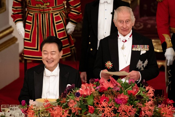 South Korean President state visit to the UK President of South Korea Yoon Suk Yeol listens as King Charles III speaks at the state banquet at Buckingham Palace, London, for the state visit to the UK  ...