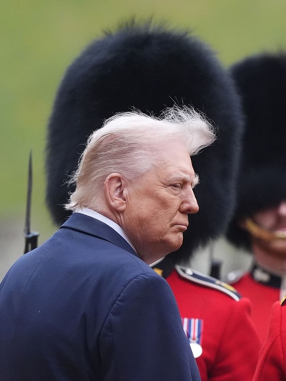 WINDSOR, ENGLAND - SEPTEMBER 17: US President Donald Trump reviews the guard of honour during the ceremonial welcome during the State visit by the President of the United States of America on Septembe ...
