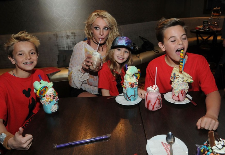 ORLANDO, FL - MARCH 13: (EDITORS NOTE: Image has been retouched.) Britney Spears enjoys a family outing with Jayden Federline, Maddie Aldridge and Sean Federline at Planet Hollywood Disney Springs on  ...