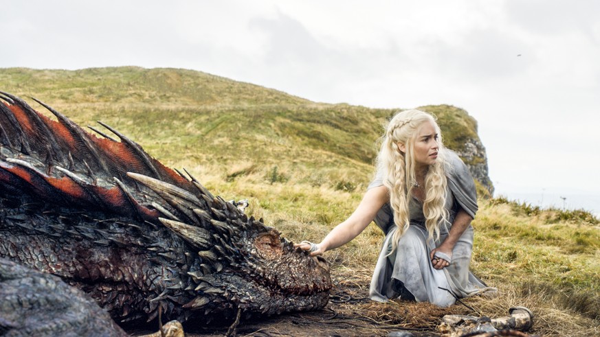 In this image released by HBO, Emilia Clarke appears in a scene from &amp;quot;Game of Thrones. Clarke was nominated for an Emmy Award on Thursday, July 16, 2015, for outstanding supporting actress in ...