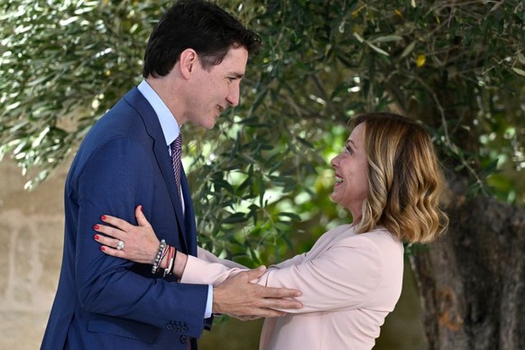 FASANO, ITALY - JUNE 13: Canadian Prime Minister Justin Trudeau is greeted by Italian Prime Minister Giorgia Meloni during a welcome ceremony on day one of the 50th G7 summit at Borgo Egnazia on June ...