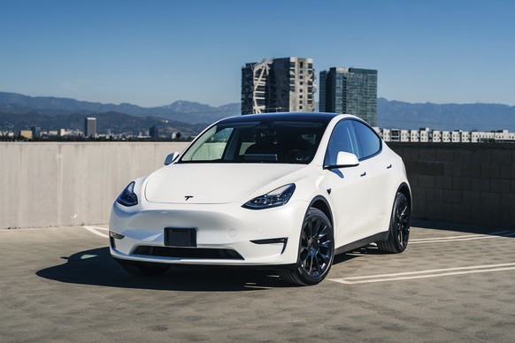 This photo provided by Edmunds shows the 2023 Tesla Model Y. It&#039;s become the best-selling EV in the United States thanks to its versatility, sporty performance and quick charging capability. (Rya ...