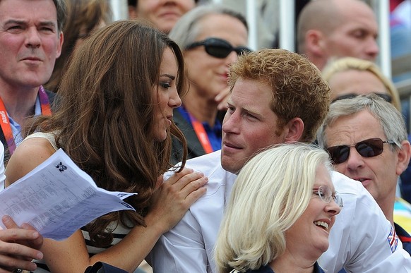 LONDON, ENGLAND - JULY 31: Catherine, Duchess of Cambridge and Prince Harry look on during the Show Jumping Eventing Equestrian on Day 4 of the London 2012 Olympic Games at Greenwich Park on July 31,  ...