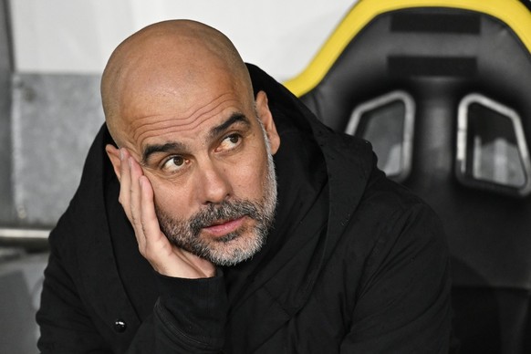 Manchester City&#039;s head coach Josep Guardiola looks on ahead of the UEFA Champions League group G soccer match between Switzerland&#039;s BSC Young Boys and England&#039;s Manchester City Football ...
